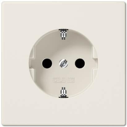 Розетка с заземлением с защитными шторками безвинтовой зажим Jung LS 990 бежевая LS520KI