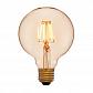 Лампа светодиодная филаментная E27 4W 2200K золотая 056-779a - фото №1